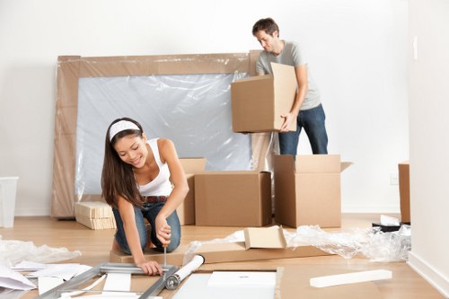 House removals planning in Colyers with moving boxes and packing supplies