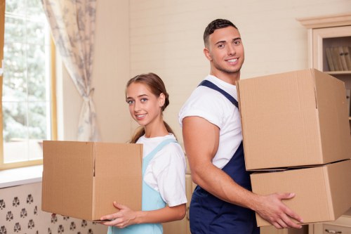 Packing boxes and preparing belongings for storage in Colyers